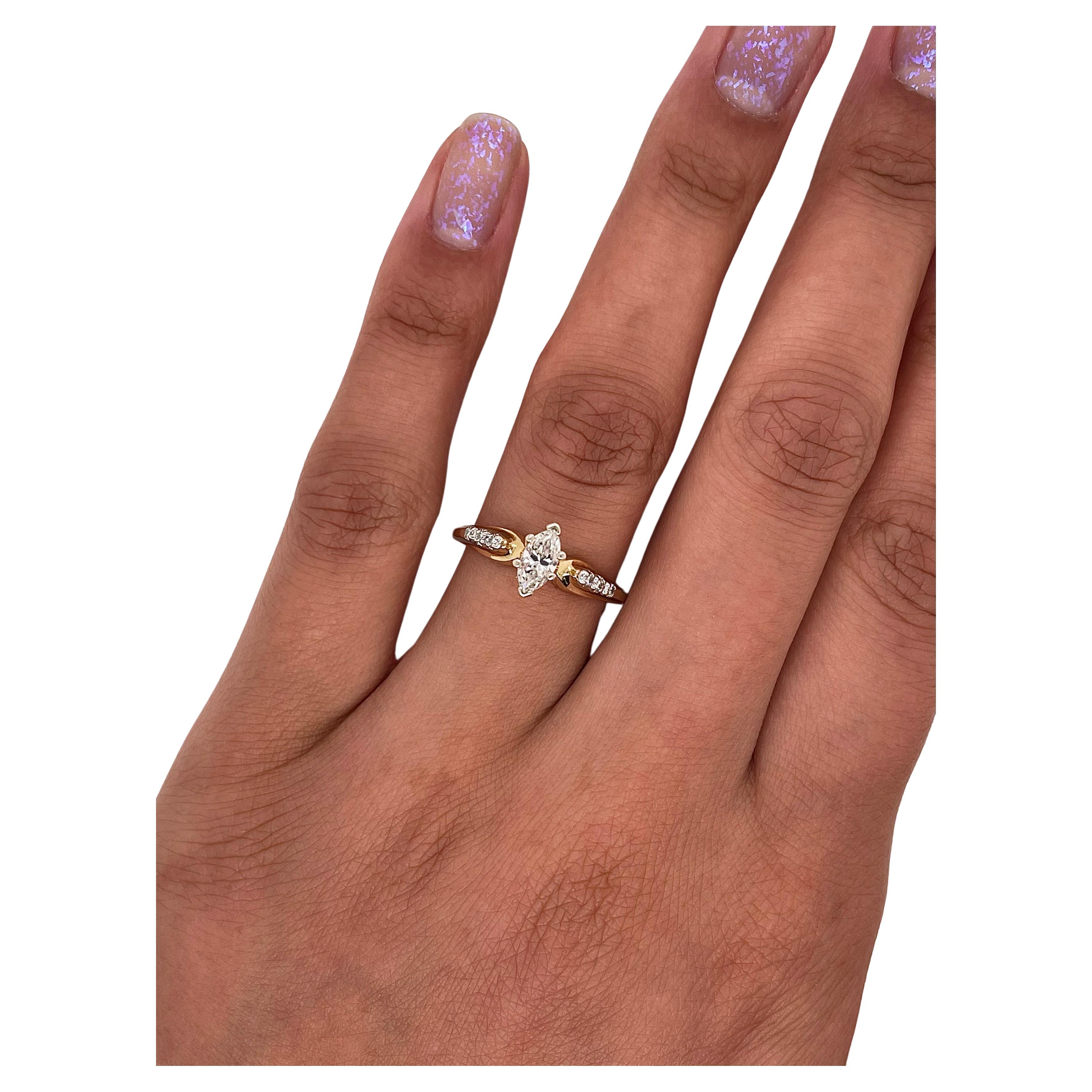 0.28 Total Carat Marquise Prong-Set Engagement Ring

-14K Yellow Gold
-0.25 Carat Marquise Center Stone  
-H-I Color
-SI Clarity
-0.03 Carat Round Side Stones
-Size 7.25

Resize is available!

Made in New York City.