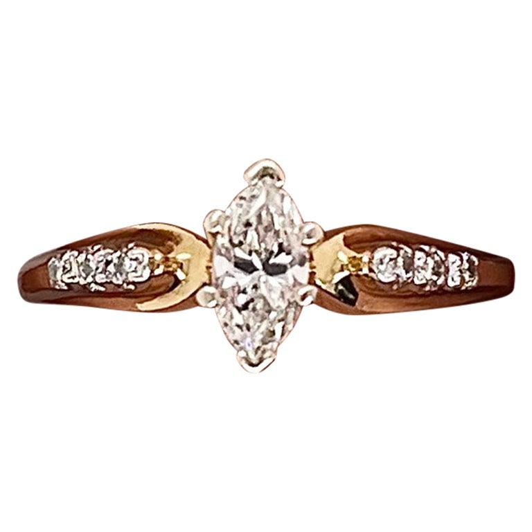Anillo de compromiso marquesa con garras de 0,28 quilates en total