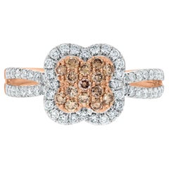 Anello con diamanti rosa da 0,28 carati e diamanti da 0,43 carati incastonati in oro rosa 14k
