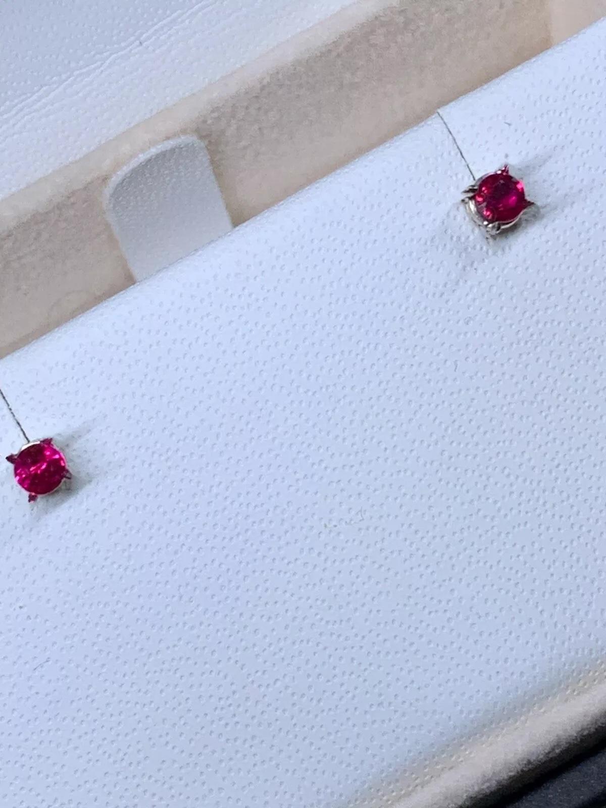 Round Cut 0.28ct Ruby Burma Solitaire Stud Earrings In 18ct White and Yellow Gold For Sale