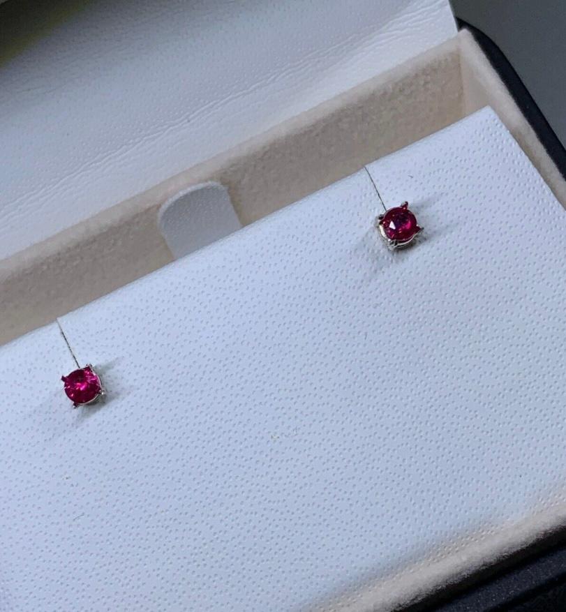 Round Cut 0.28ct Ruby Burma Solitaire Stud Earrings In 18ct White and Yellow Gold For Sale