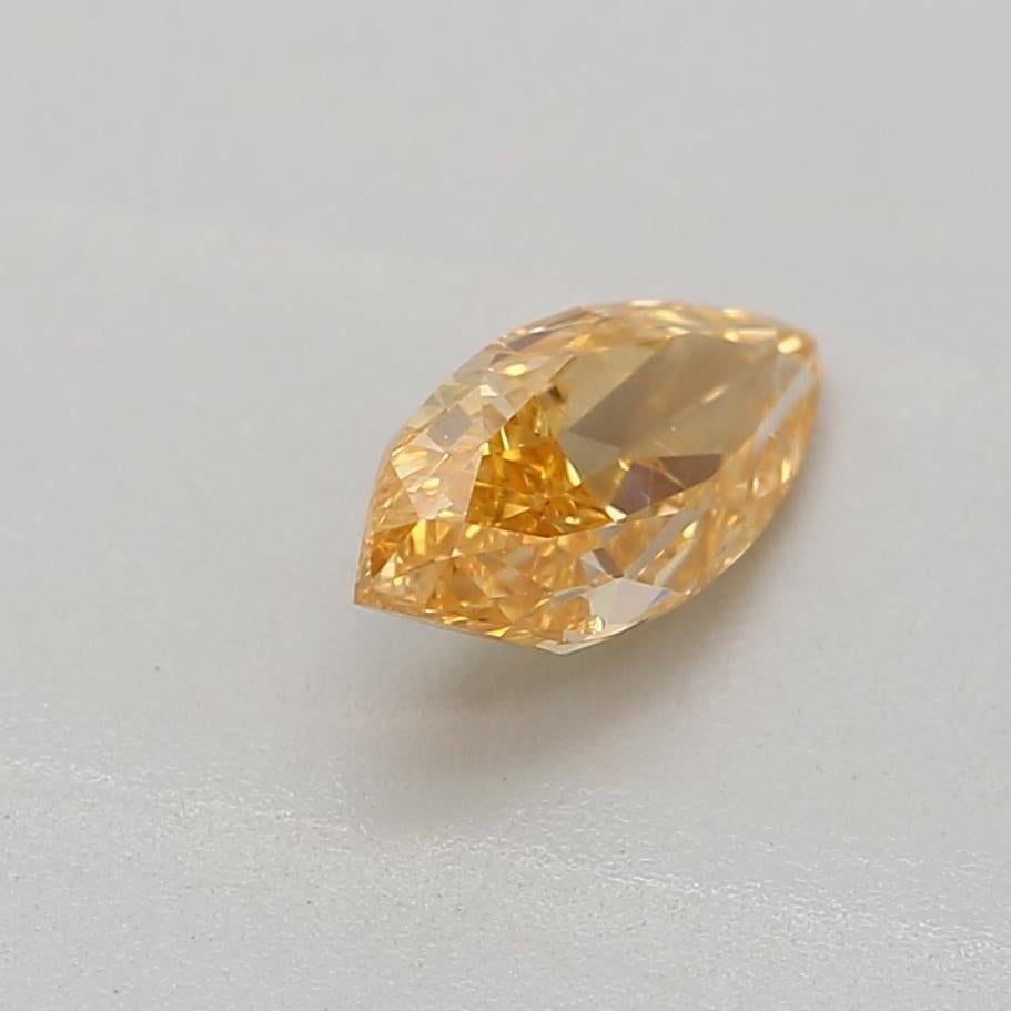 Women's or Men's 0.29 Carat Fancy Yellow Orange Marquise cut diamond I1 Clarity GIA Certified For Sale