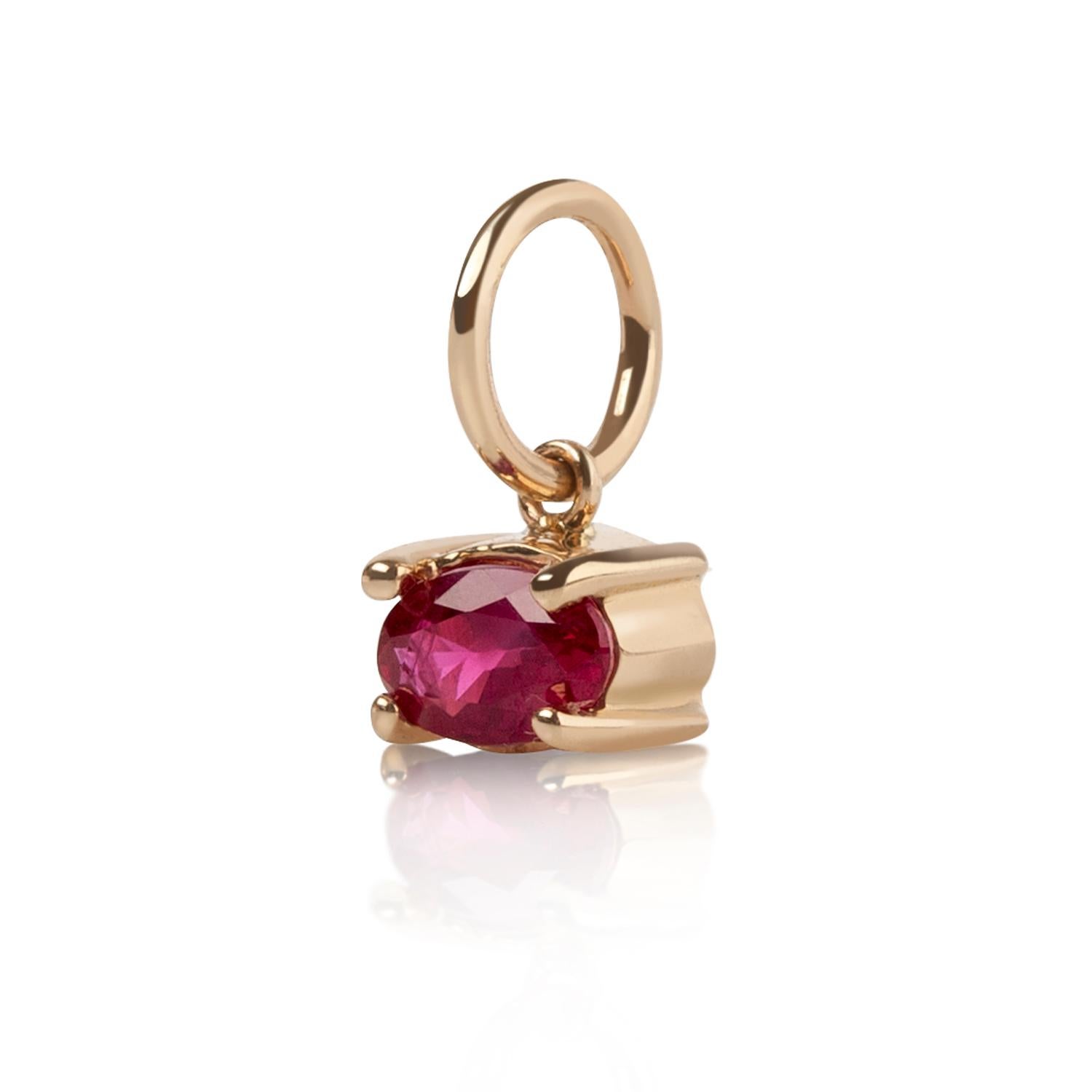 Sweet and bold oval Ruby charm, set with prongs. Add this to our Plaza charm pendant with pink sapphire and create your own personalized charm necklace!

Inspired by seeing the cross-section view of life, as if slicing a tree to see its underlying
