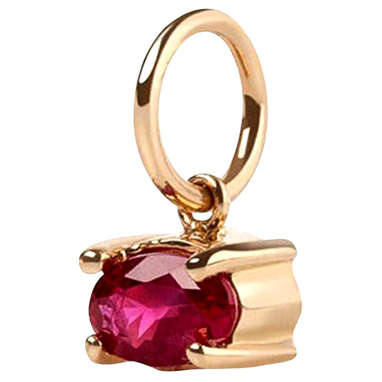 0.29 Carat Oval Ruby Stone Charm 14 Karat Gold For Sale