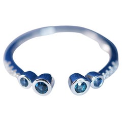Vintage 0.29 Carat Round Cut Blue Sapphire and Round Diamond 18K White Gold Ring