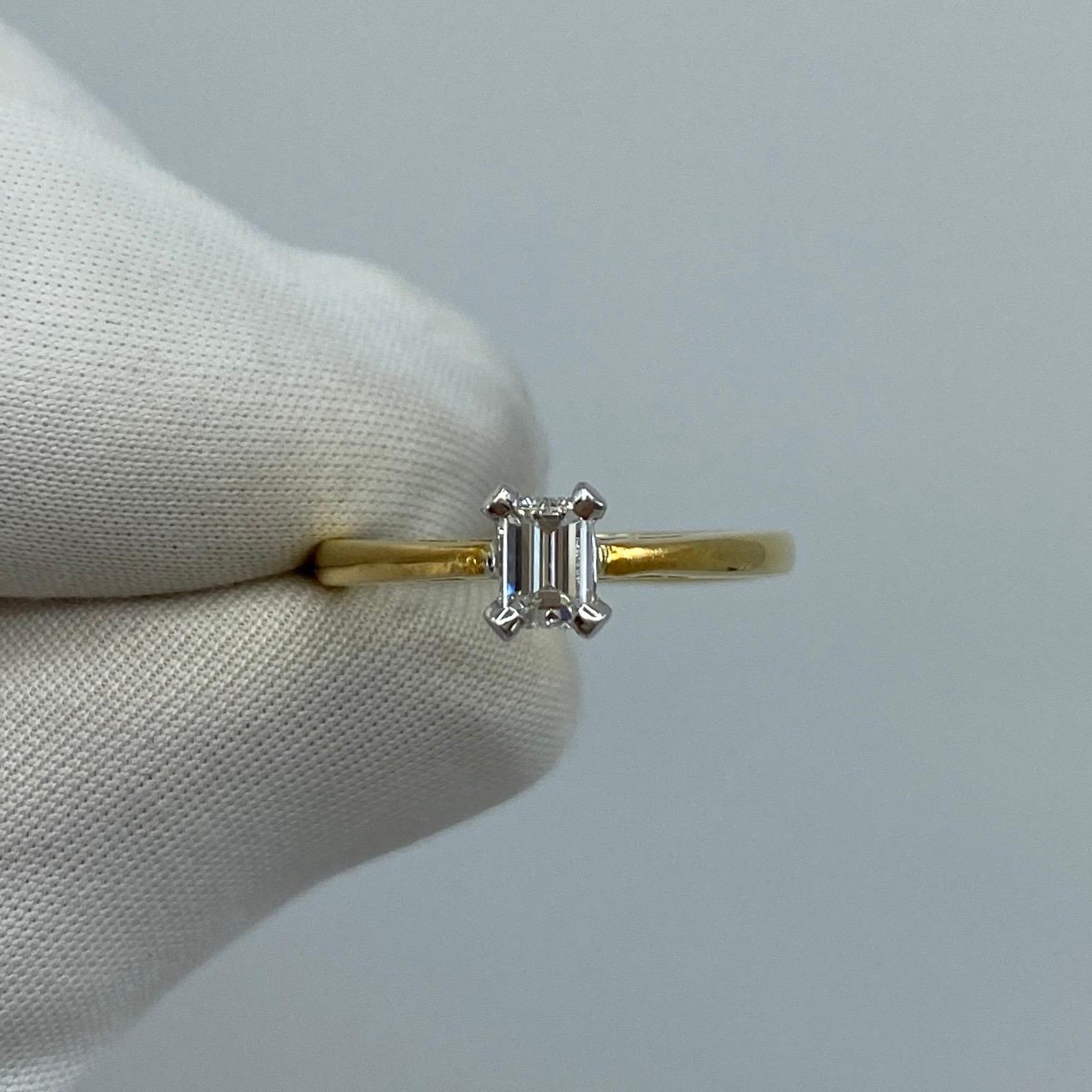 18k Yellow & White Gold Emerald Cut Diamond Solitaire Ring.

0.29 Carat diamond with Si1 clarity and E/F colour. Also has an excellent emerald/octagonal cut.

Ring size I. The ring is re-sizeable.

Fully hallmarked to guarantee metal quality.

Some