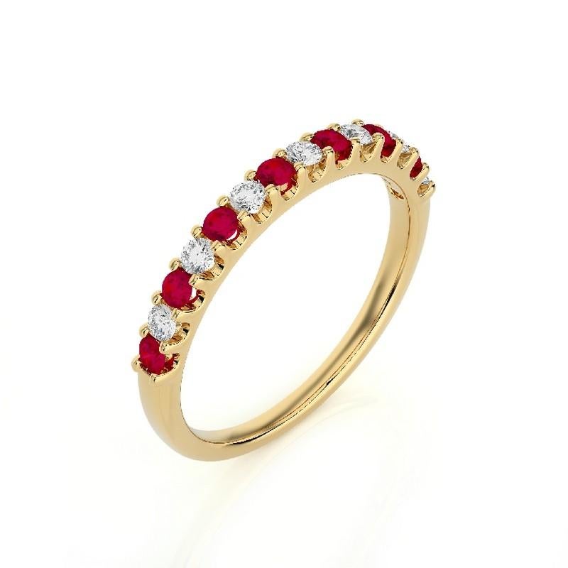 Diamond and Ruby Total Carat Weight: This exquisite 1981 Classic Collection wedding ring features a total carat weight of 0.2 carats, with 7 brilliant round diamonds and 7 round rubies, creating a beautiful and colorful ensemble.

Gold Setting: