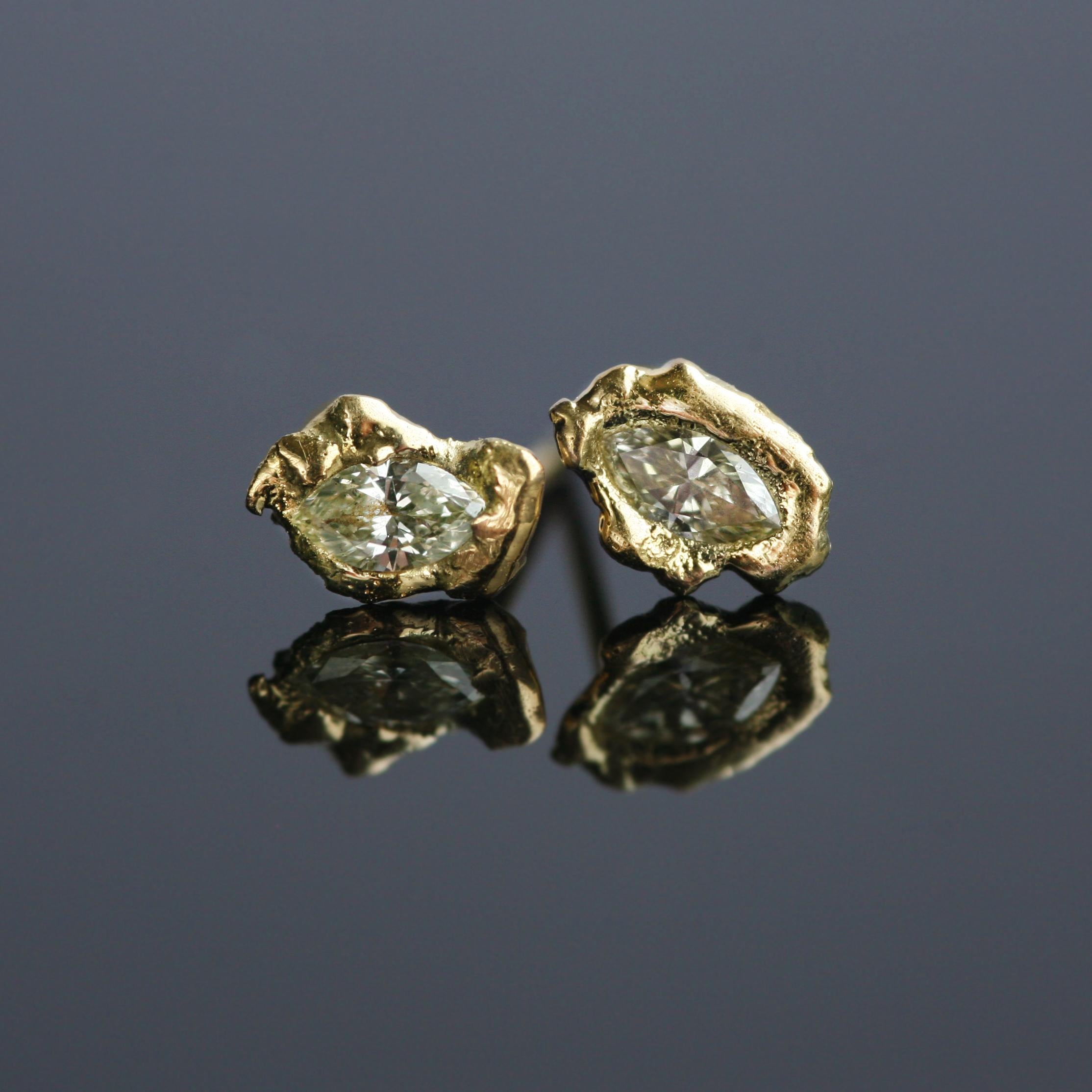 0.3 Carat Yellow Diamond Marquise Cut Organic 18k Gold Stud Earrings.

A moment of stillness captured in the Lava Naples Marquise Stud Earrings, within which molten 18k gold solidifies around pale yellow marquise-cut diamonds. Sculpted through