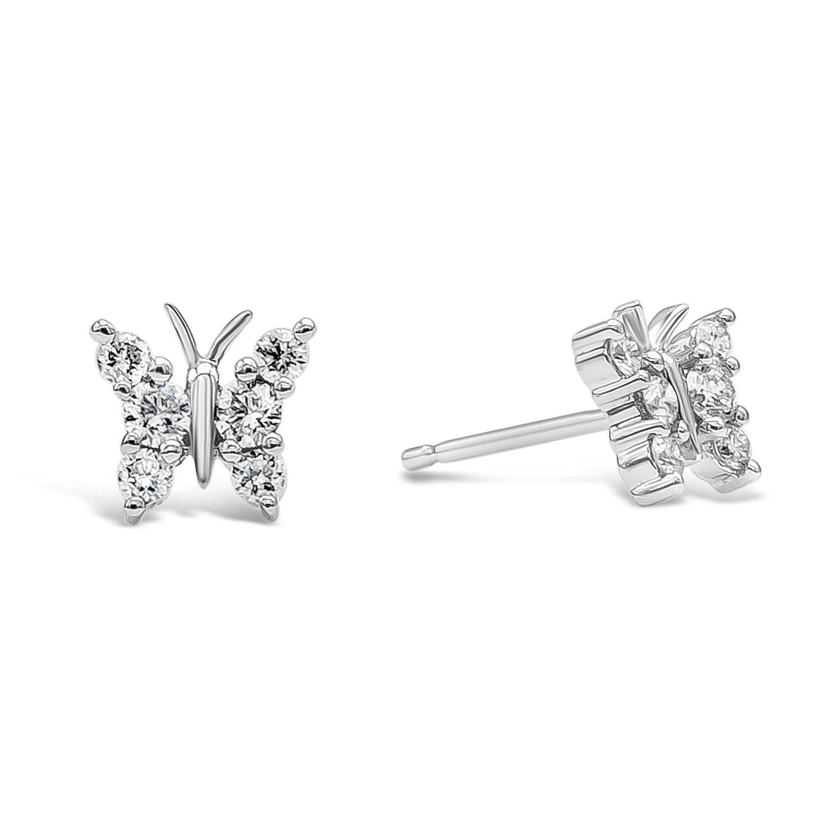 A simple and stylish pair of earrings featuring 12 pieces of brilliant round diamonds, weighing 0.30 carat total, F Color, VS-SI in Clarity. Beautifully set in a butterfly motif design and Made in 18K White Gold.

Style available in different price