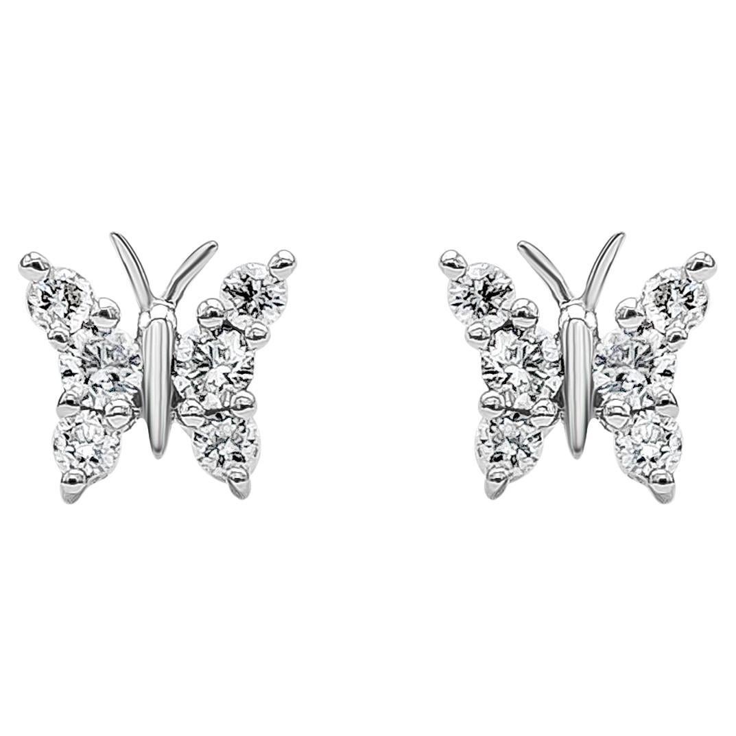 Clous d'oreilles à la mode papillon en diamants taille ronde brillants de 0,30 carat