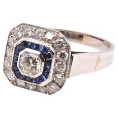 Vintage 0.30 carat central diamond ring with 16 diamonds