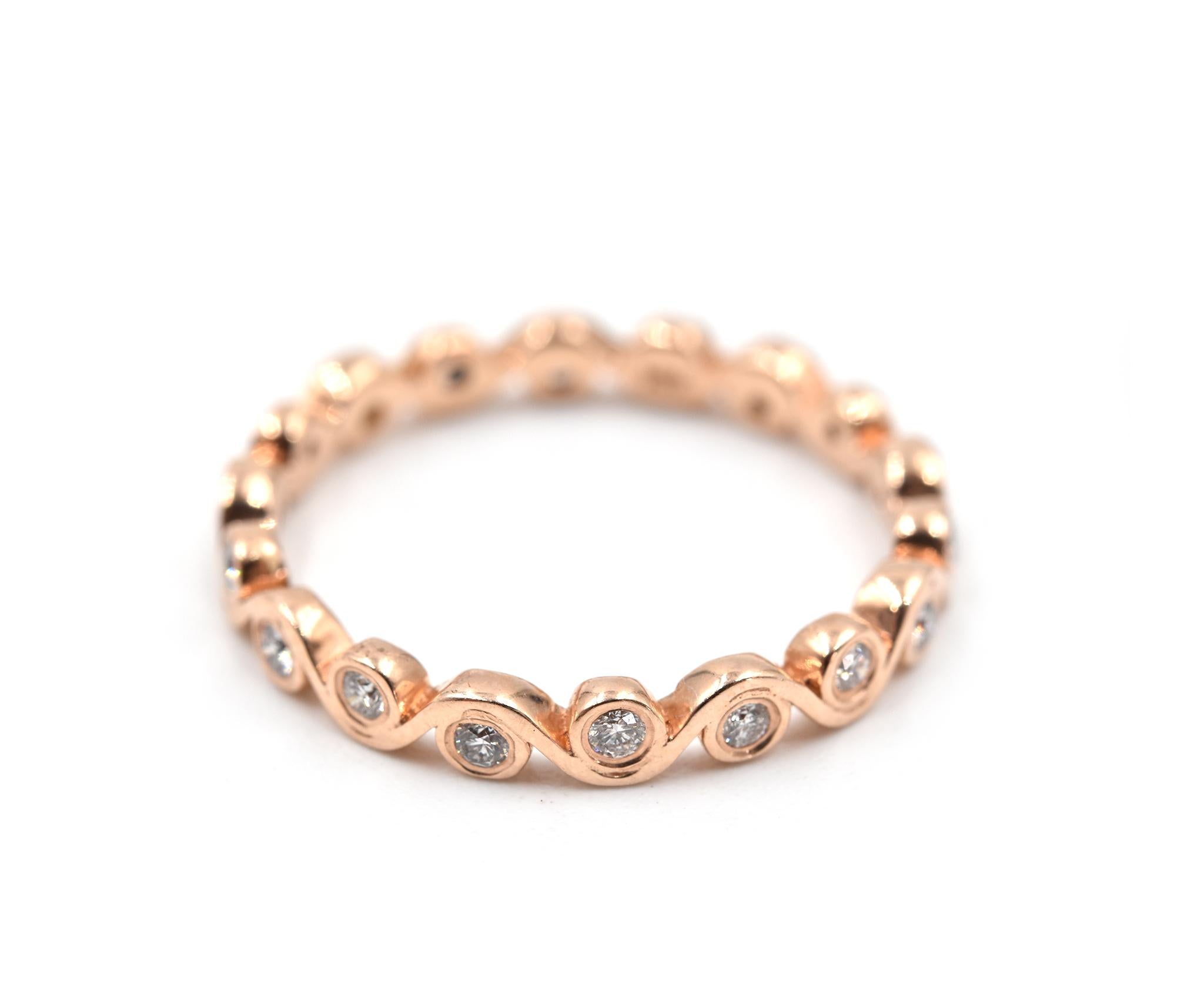 0.30 Carats Diamond 14k Rose Gold Swirl Style Eternity Band

Designer: custom design
Material: 14k rose gold
Diamonds: 18 round brilliant cut = 0.30 carat weight
Color: G
Clarity: VS
Ring size: 7 1/2 (please allow two additional shipping days for
