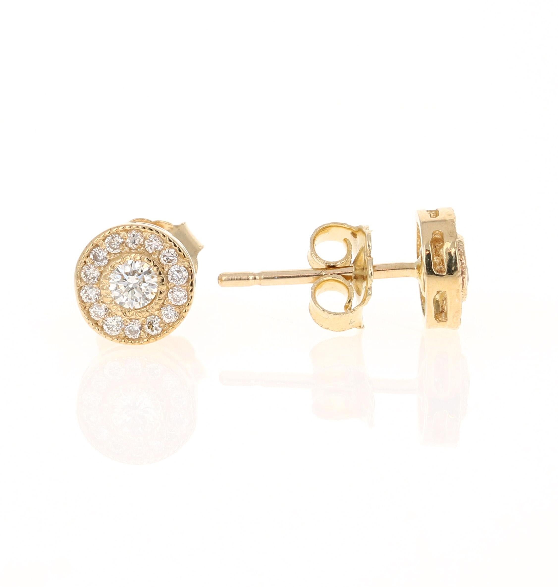 This unqiue design of diamond earrings has 30 Round Cut Diamonds that have 0.30 carats and a clarity and color of VS-H. 
They are set in 14 Karat Yellow Gold and weigh 1.2 grams

The width of the earrings are 7 mm. 



