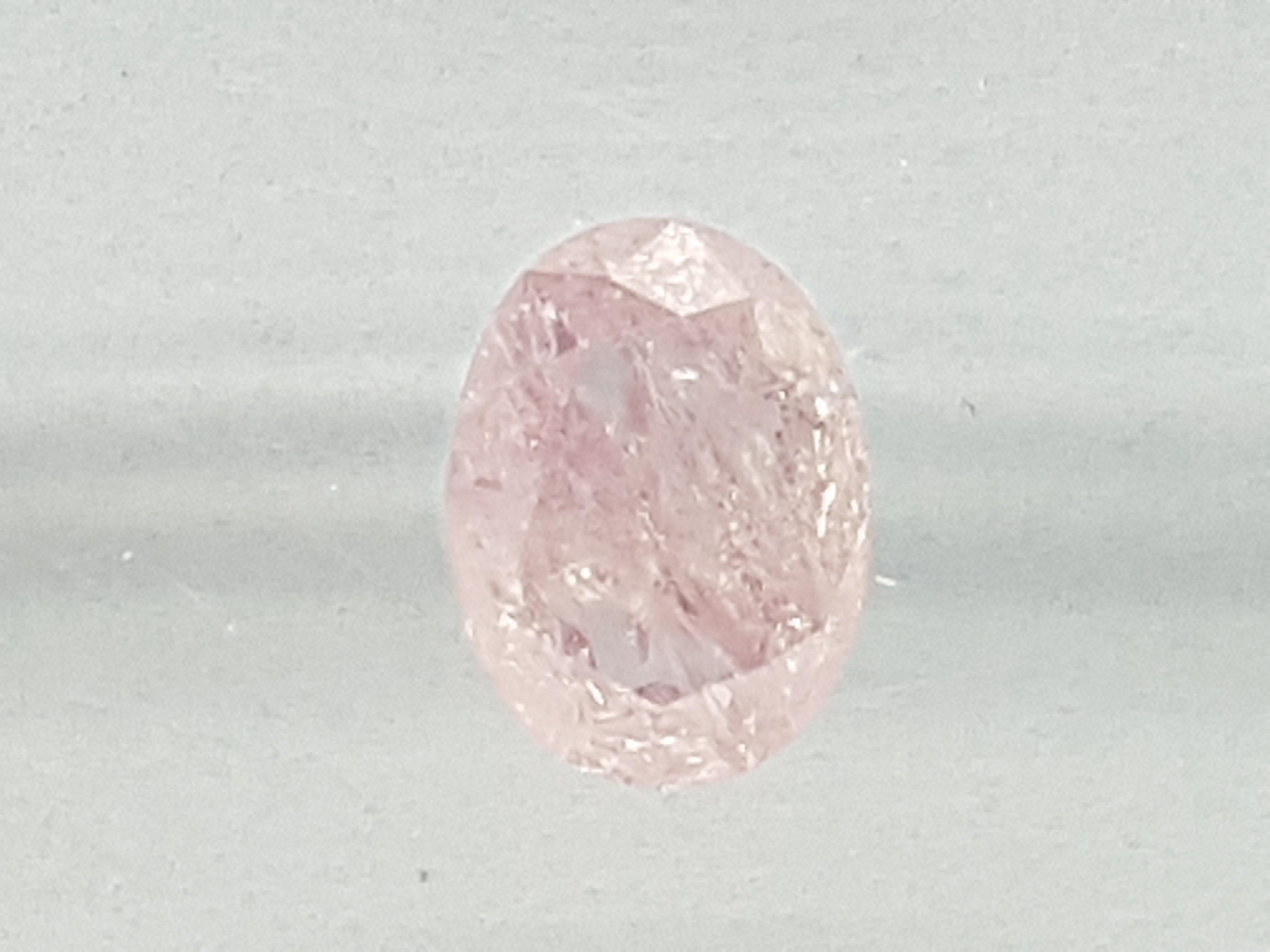Cut: Oval 
Weight: 0,30 ct 
Color: Fancy pink Natural 
Clarity: P ( Not stated on Certificate. ) 
EGL Belgium Certificate Number: 700032 
Shipping: free worldwide insured shipping 
All our jewellery comes with a certificate appraisal and 5 years