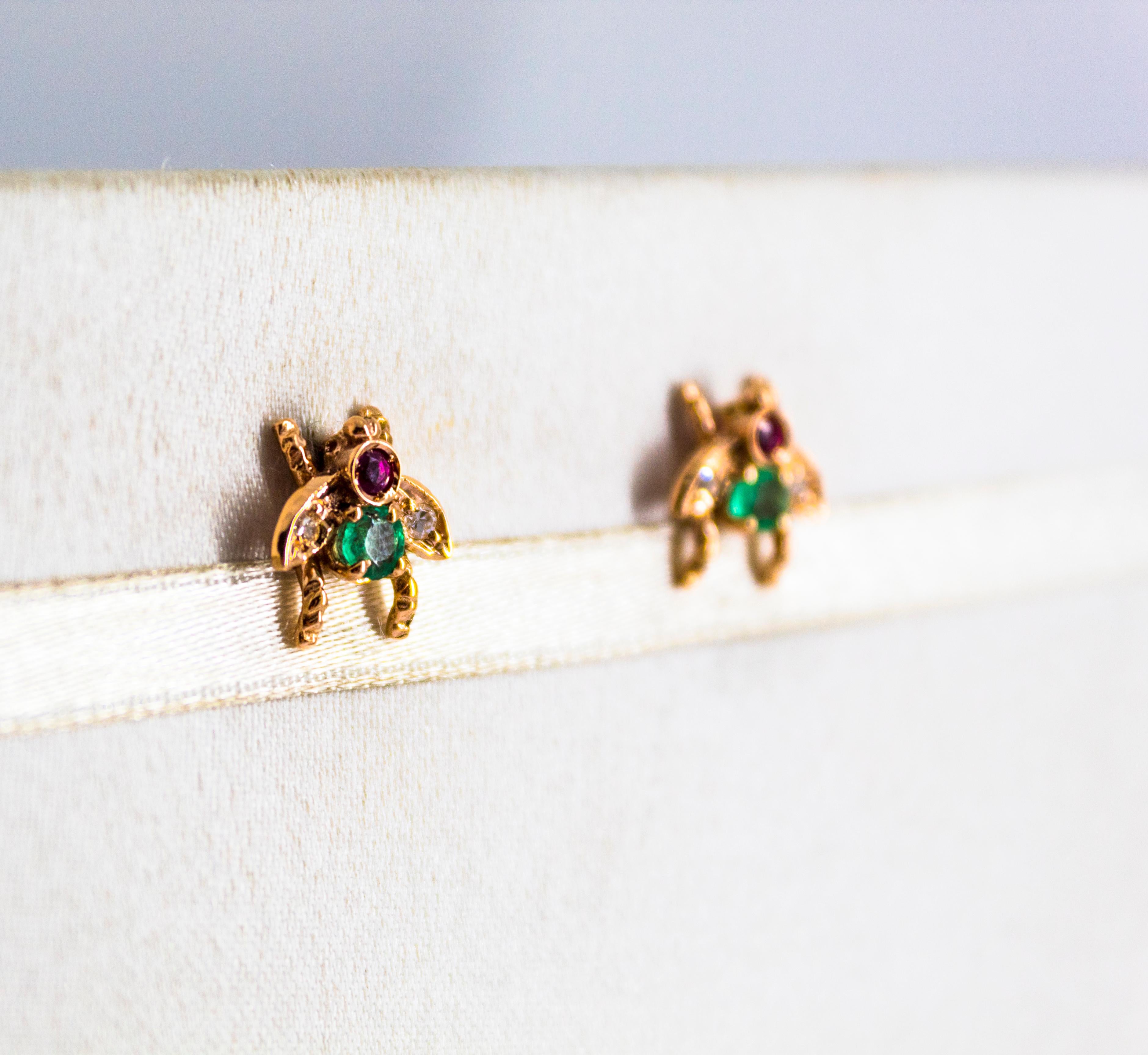 These Stud Earrings are made of 9K Yellow Gold.
These Earrings have 0.08 Carats of White Diamonds.
These Earrings have 0.30 Carats of Emeralds and Rubies.
These Earrings are available also with Blue Sapphires, Aquamarine or any different precious