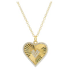 Collana con ciondolo di diamanti a forma di cuore da 0,30 carati in oro giallo 18 carati