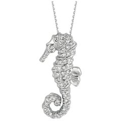 Collier cheval de mer avec pendentif en or blanc 14 carats et diamants naturels de 0,30 carat