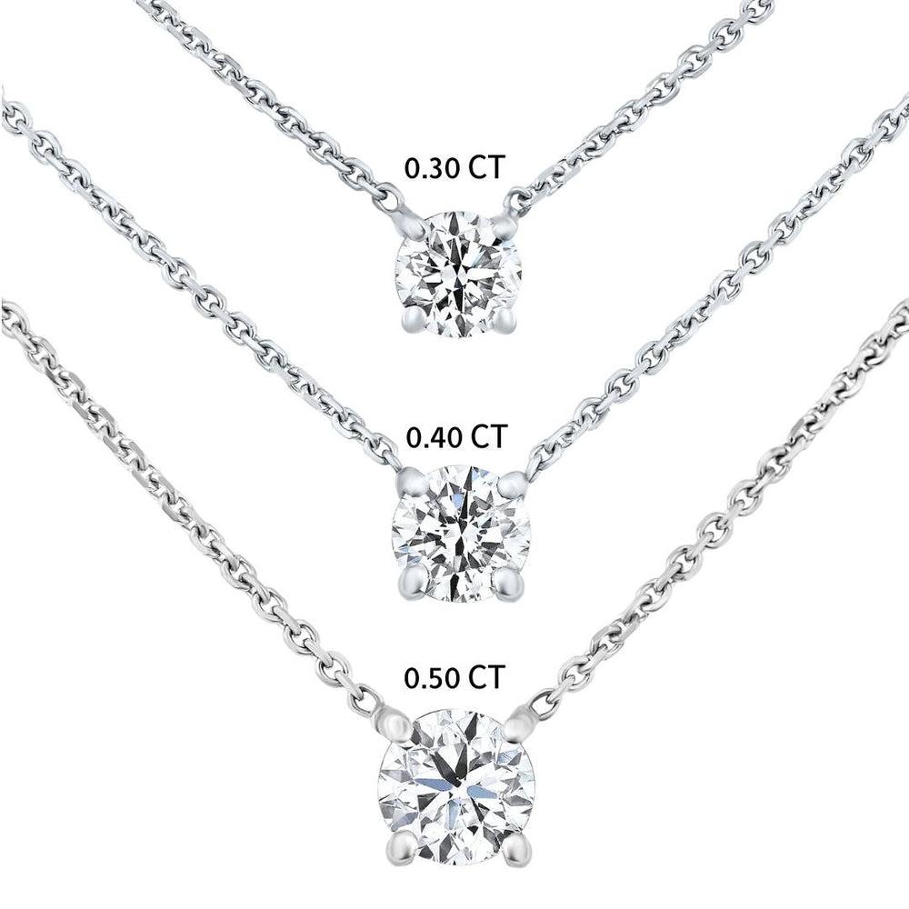 0.30 Carat Round Solitaire Diamond Necklace in 14K White Gold, Shlomit Rogel

A classic 14K white gold solitaire necklace embellished with a beautiful natural round 0.30 carat diamond in a prong setting. This classic pendant necklace from our Ara