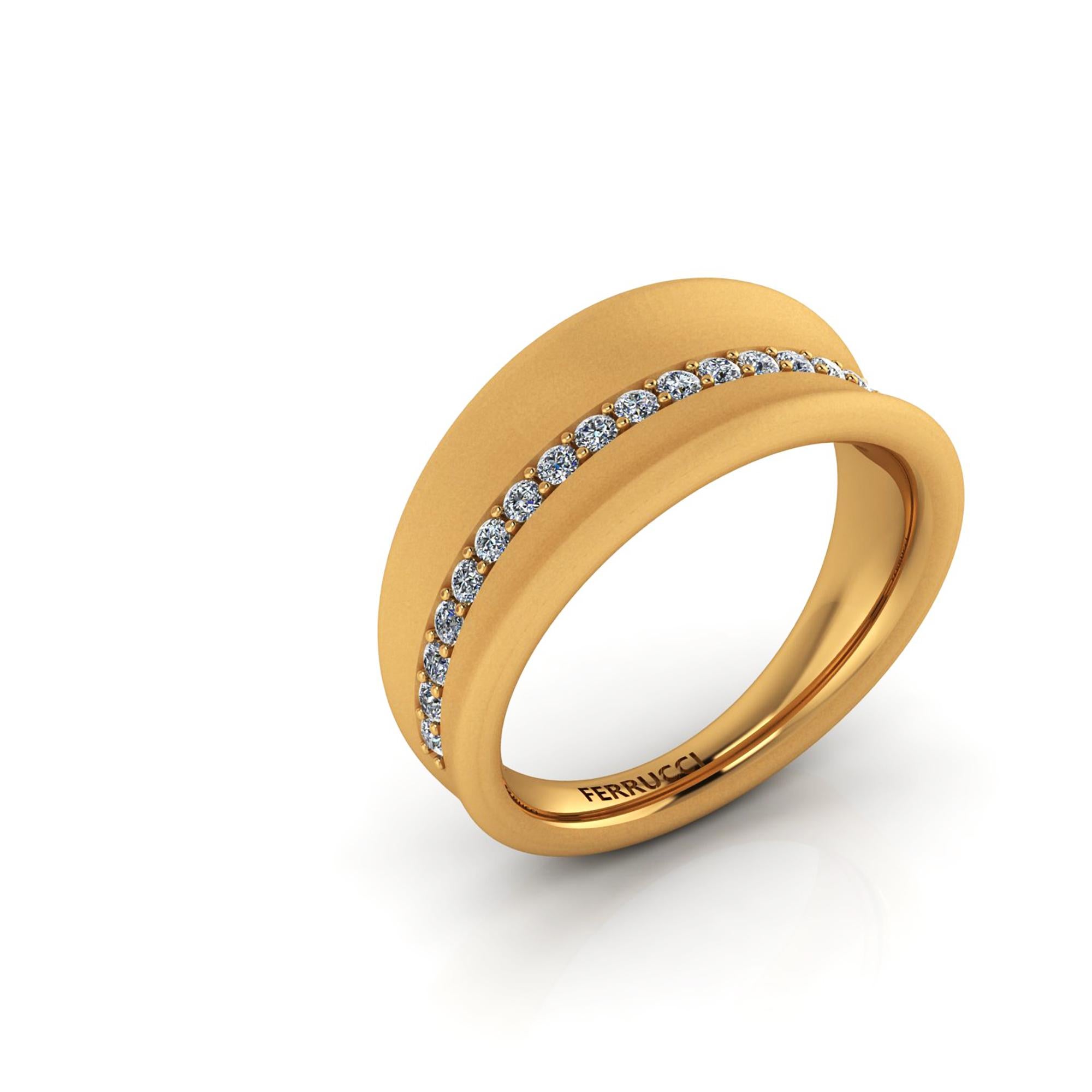 Solid 18k gold curved, organic  band, tapered at the bottom, round profile for maximum comfort fit, with 0.30 carat of bright white diamonds pave' hand set on a center line, bold and model design, being solid gold it gives you the rich weight of a