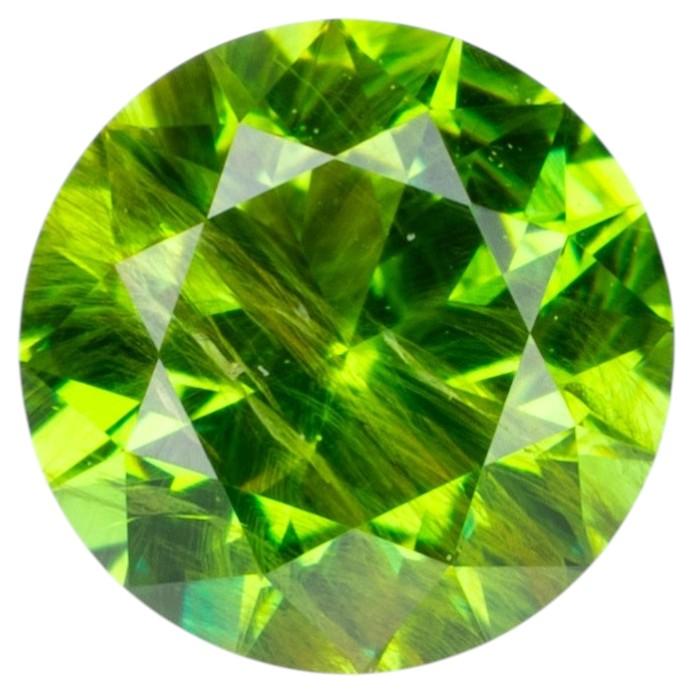 0.30 ct, Faceted Russian demantoid garnet with bissolite inclusions