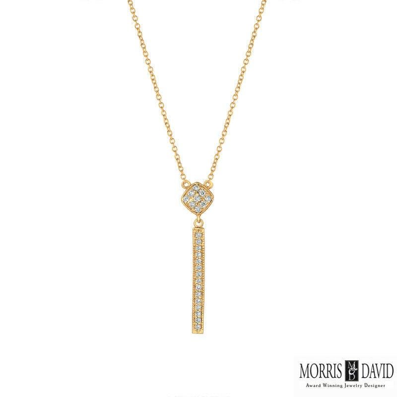 diamants 100% naturels, non rehaussés de quelque manière que ce soit Collier de diamants taille ronde  
0.30CT
G-H 
SI  
1 5/16 pouce en hauteur, 1/4 pouce en largeur
or blanc 14K,    Style pavé,   2.7 grammes
24 Diamants

N5552W
TOUS NOS ARTICLES