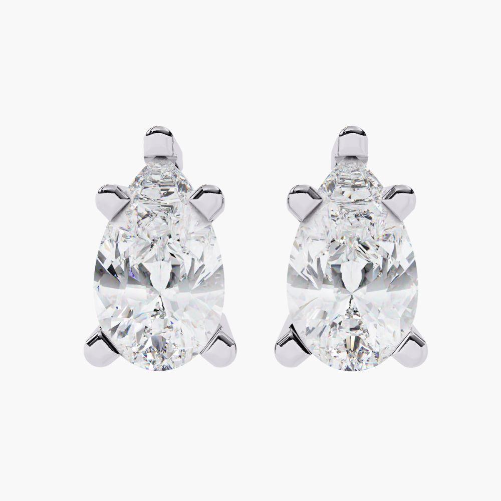 Product Details
Metal Type:  14K Gold
Diamond Type: Natural Diamond
Carat Total Weight (ctw): 0.30 Ctw
Total Number of Stones: 2 pcs
Diamond Cut: Pear 
Diamond Color: Near Colorless 
Diamond Clarity: SI+
Setting Type: Prong Setting
Closure: