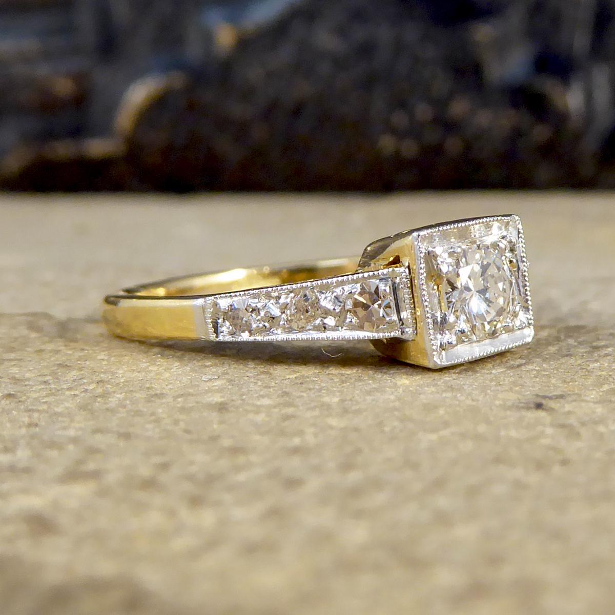 This ring was hand crafted in the Art Deco era and modelled form 18ct Yellow Gold with an 18ct White Gold setting. In the centre sits a 0.23ct Round Cut Diamond with Diamond set shoulders with a total of 0.30ct. A classic Art Deco ring that can be