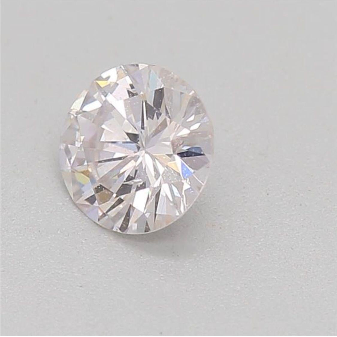 0.31 Carat Faint Pink Round Cut Diamond SI1 Clarity CGL Certified For Sale 8