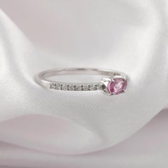 0.31 Carat Oval Pink Sapphire 0.12 Carat SI/H Diamond Ring 10 Karat White Gold