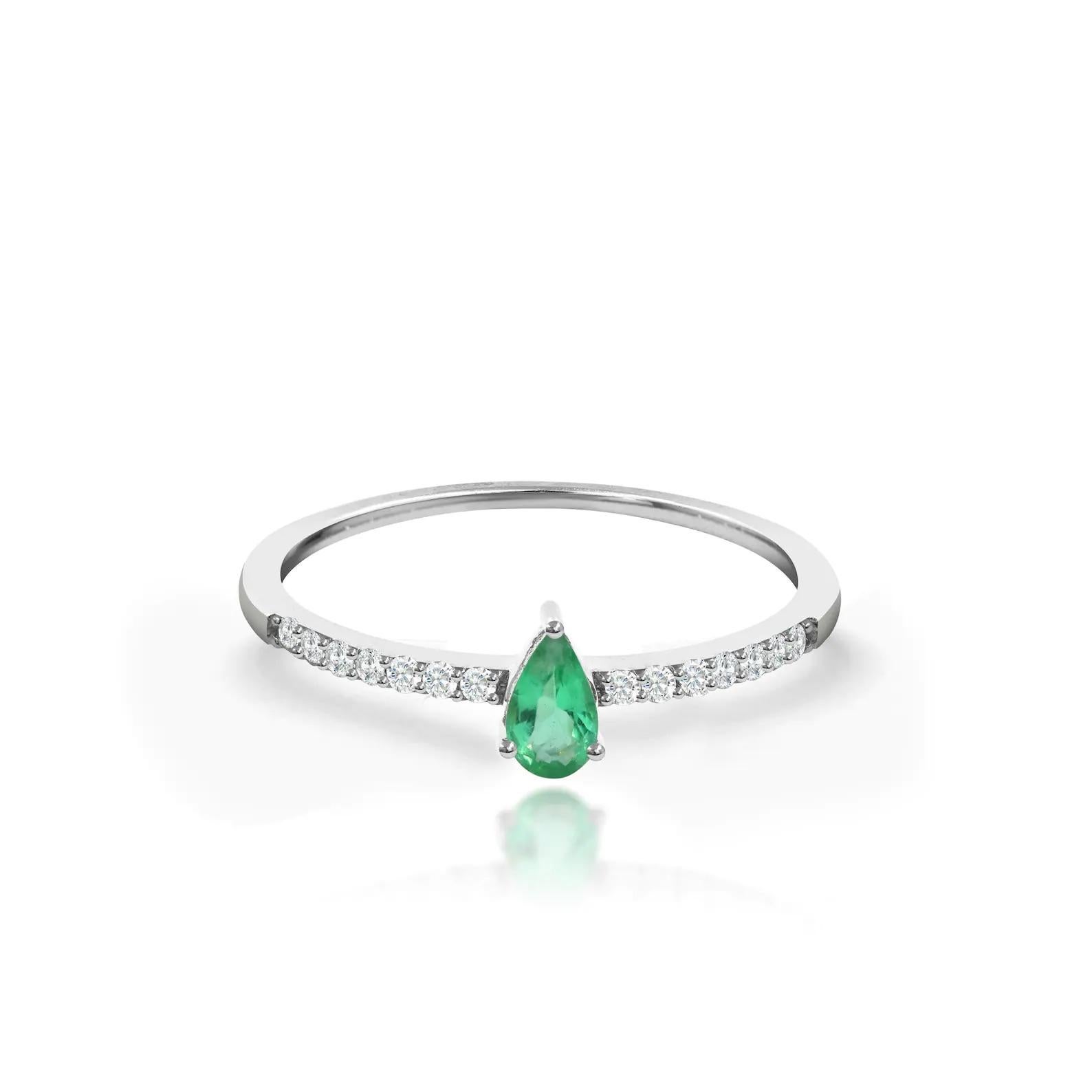 A lightweight and gorgeous emerald ring with sparkly diamonds all over is a beautiful engagement ring. Minimalist yet statement ring is made in Solid gold, Genuine emerald, and diamonds of 0.31 carat. Shop this beautiful piece now. 

