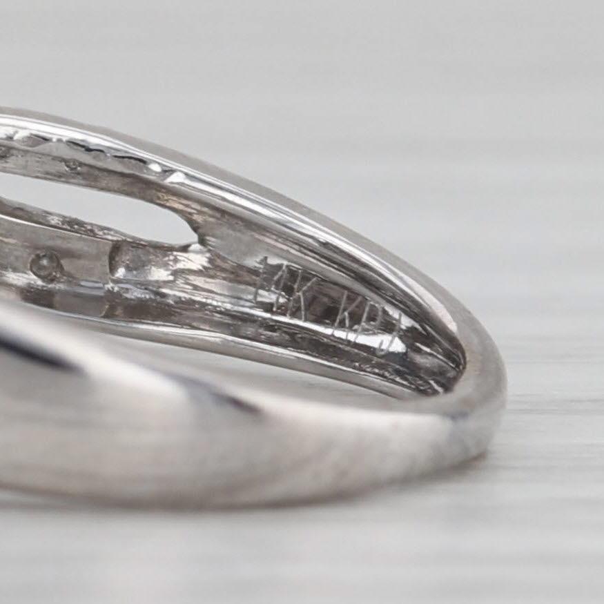 Anello di fidanzamento a forma di aureola con diamante da 0,31 ct. in vendita 5