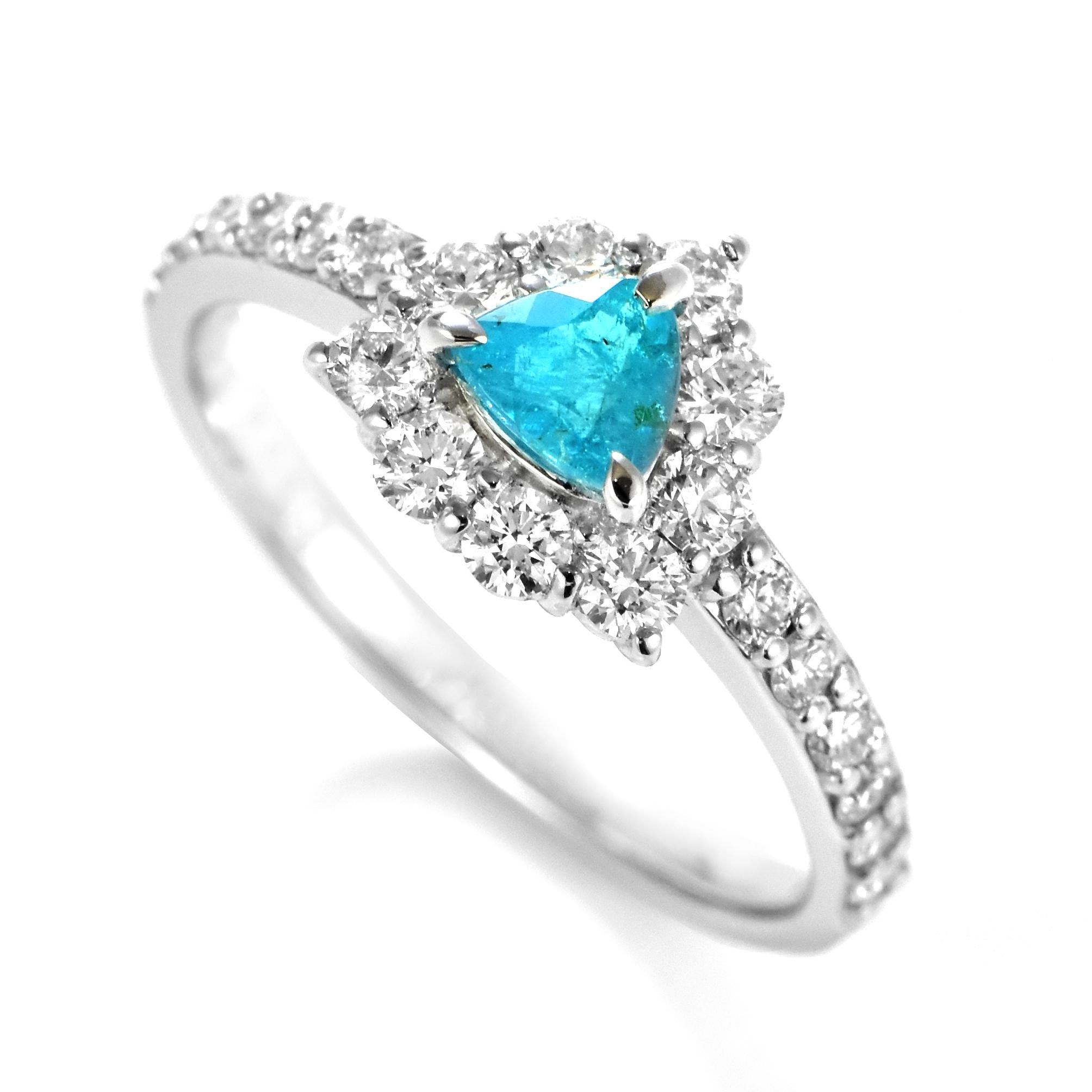 A beautiful ring featuring 0.32 Carat Natural Paraiba Tourmaline and 0.58 Carats of Diamond Accents made in Platinum. Paraiba Tourmalines were only discovered 30 years ago in the Brazilian state of the same name- Paraiba. Since then they have become