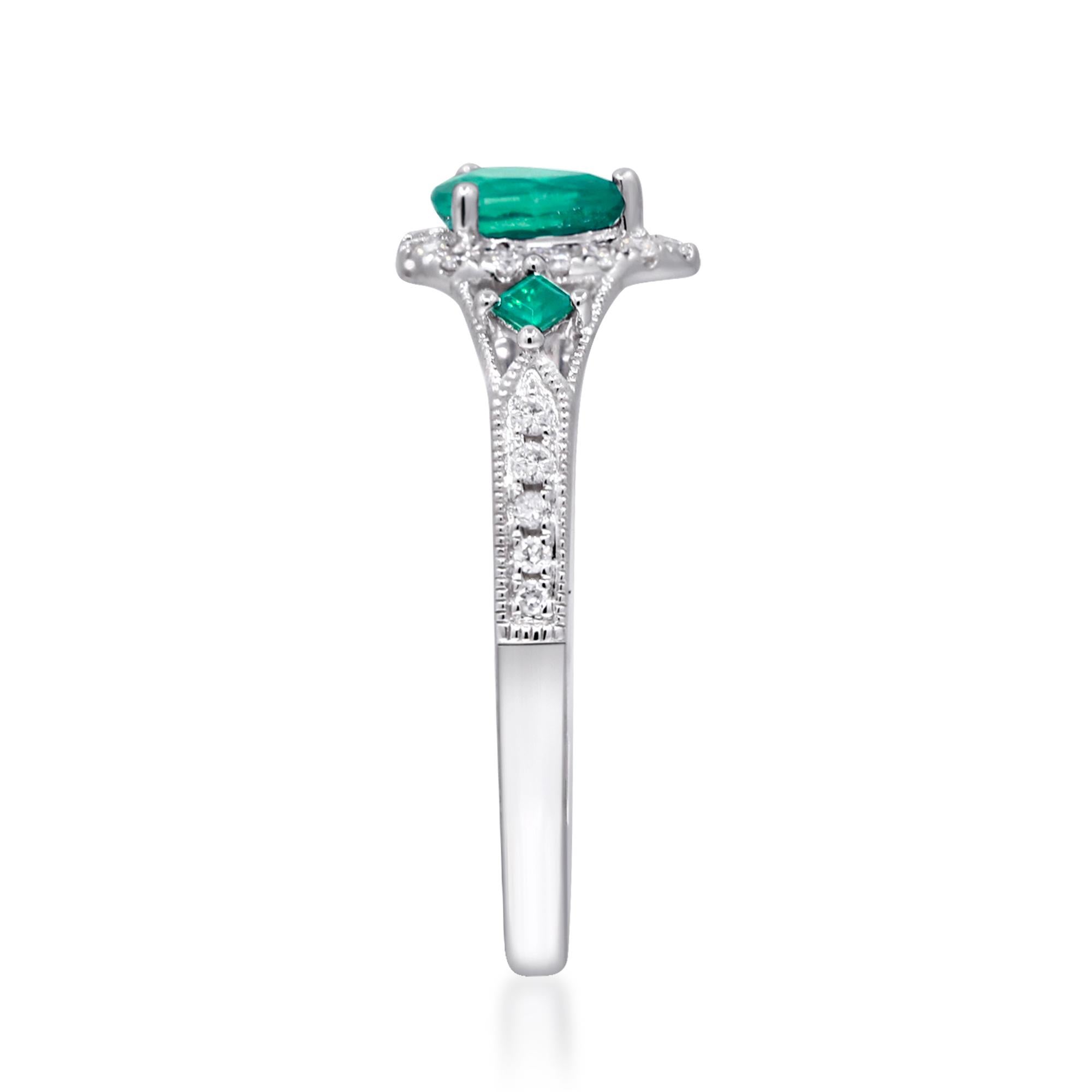 Decorate yourself in elegance with this Ring is crafted from 14-karat White Gold by Gin & Grace. This Ring is made up of 6x4 mm Pear-Cut Emerald (1 pcs) 0.32 carat, 2.0 mm Square-cut Emerald (2 pcs) 0.10 carat and Round-cut White Diamond (24 Pcs)