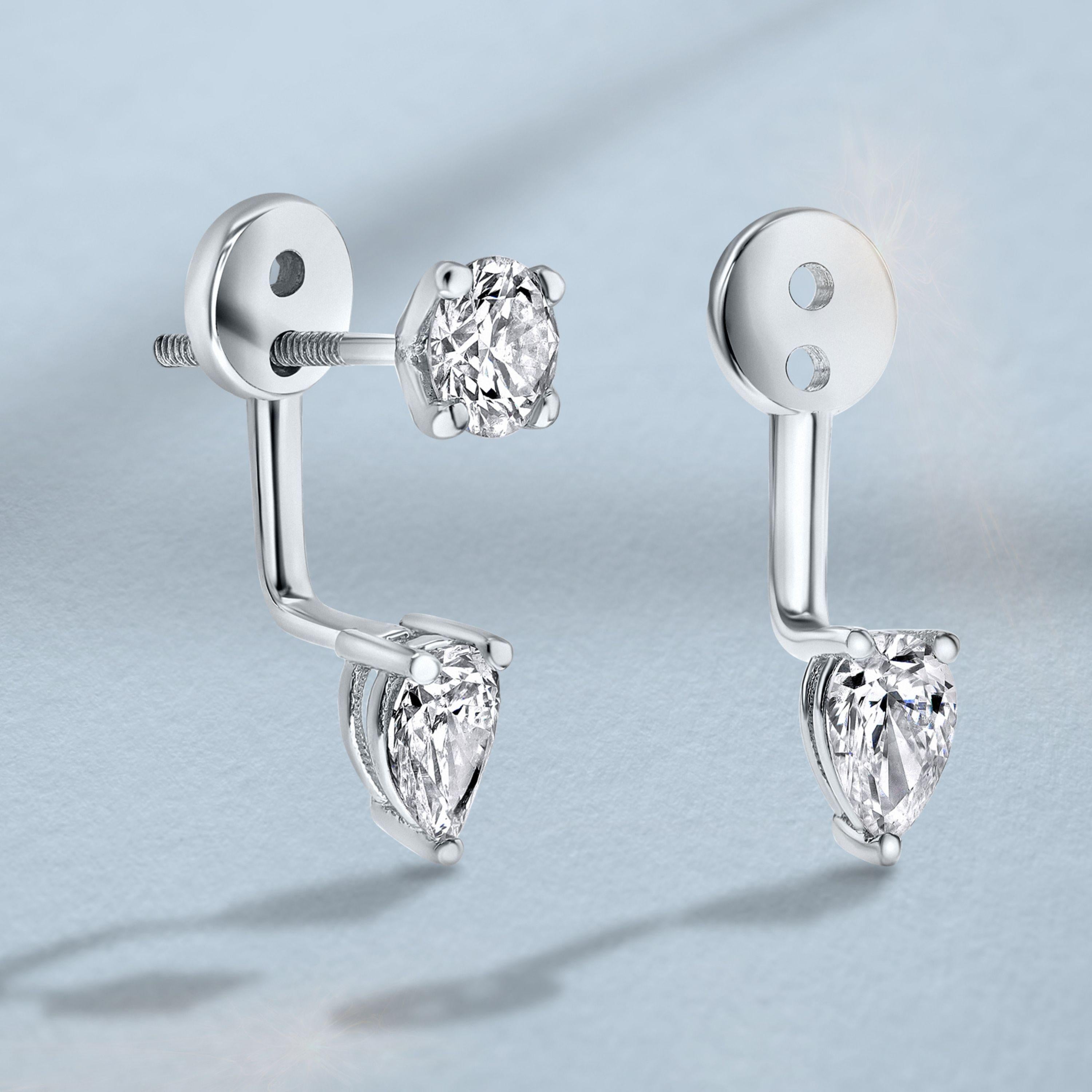 0.32 Carat Pear Shaped Diamond Ear Jackets in 14K White Gold - Shlomit Rogel

Upgrade your classic diamond studs with these 14k white gold brackets set with a pear shaped diamond, which give the appearance of a diamond floating below the