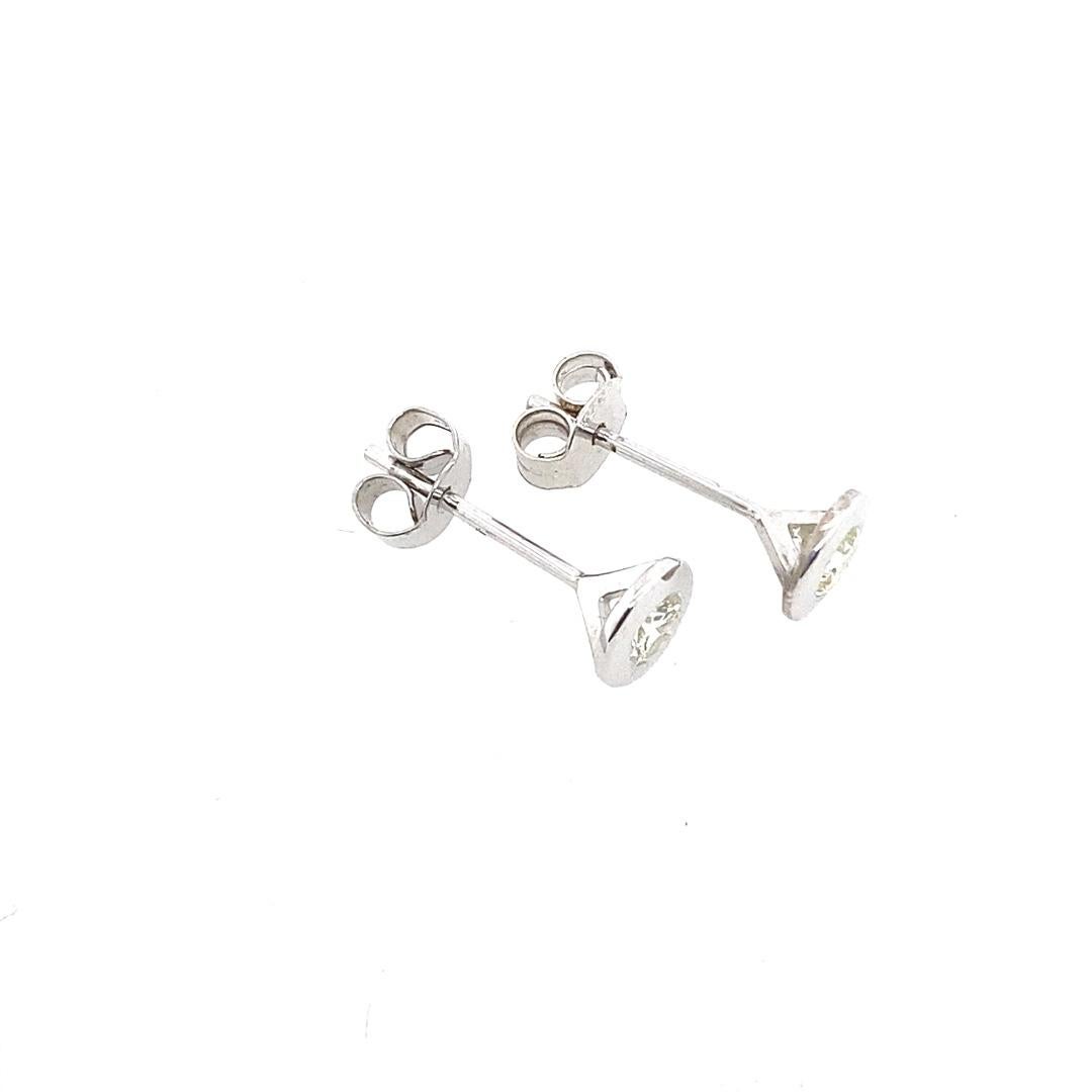 18ct White Gold Diamond Studs Earrings, In Rubover Setting, 0.32ct of diamonds

In Rubover Setting With Peg and Screw

Additional Information:
Total Diamond Weight: 0.32ct
Diamond Colour: G/H
Diamond Clarity: SI
Total Weight: 1.3g  
SMS4087