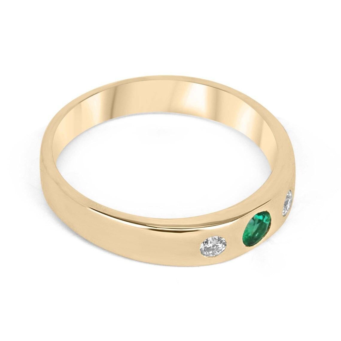 This band ring features a delicate round-cut emerald as its centerpiece, flanked by two brilliant round-cut diamonds that create a lovely three-stone look within the band. All three stones are securely bezel-set in 14k gold, adding durability and
