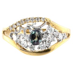 0.33 Carat Color-Changing Alexandrite and Diamond Ring set in 18K Gold/Platinum