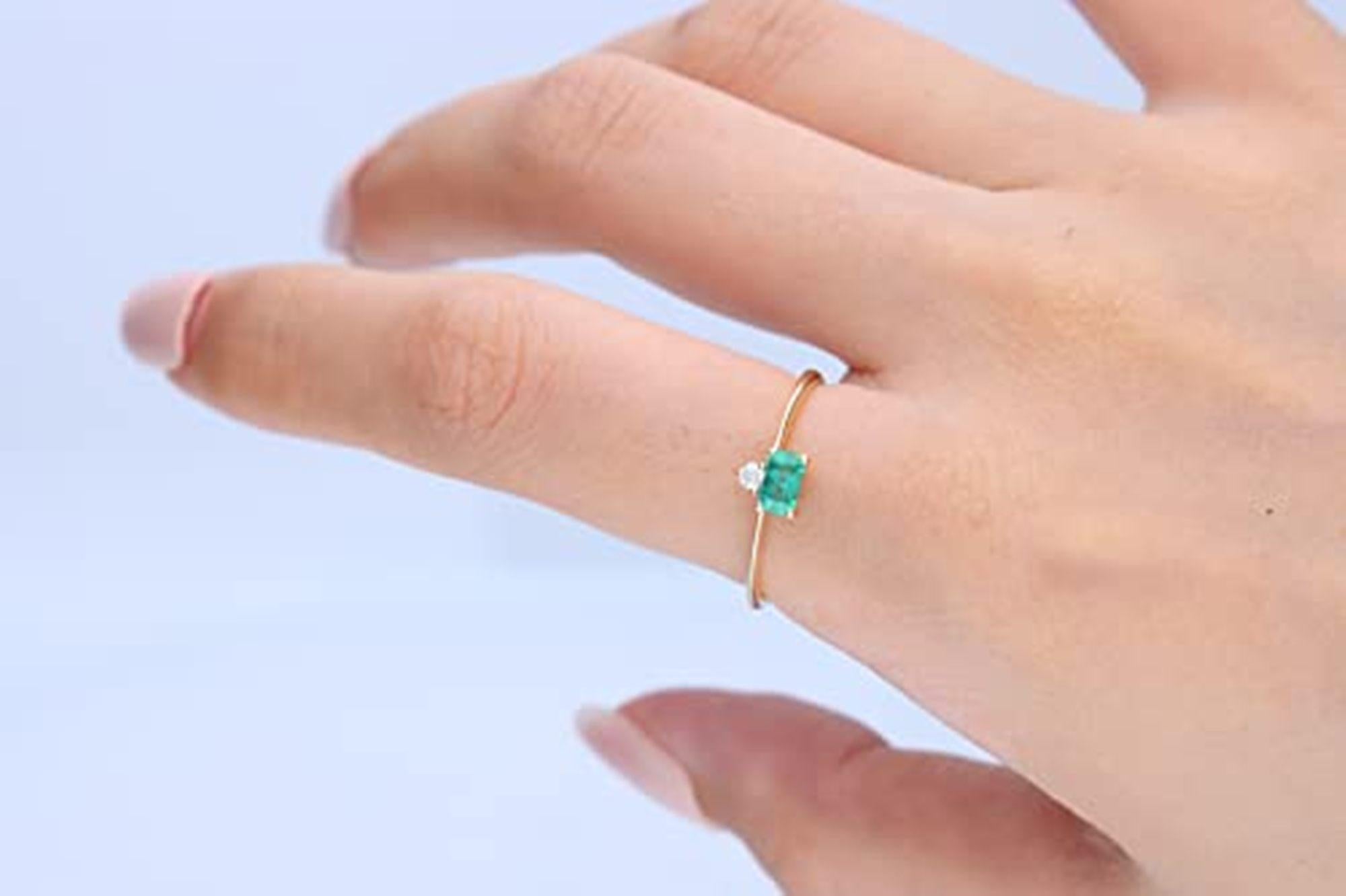 Stunning, timeless and classy eternity Unique ring. Decorate yourself in luxury with this Gin & Grace ring. The 14k Yellow Gold jewelry boasts 3x5 Emerald-cut Emerald (1 pcs) 0.33 Carat and Round-Cut Diamond (1 pcs) 0.04 Carat accent stones for a