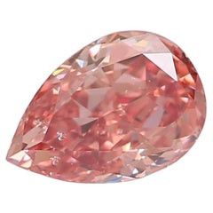 Diamant fantaisie rose orangé brunâtre taille poire de 0,33 carat certifié GIA