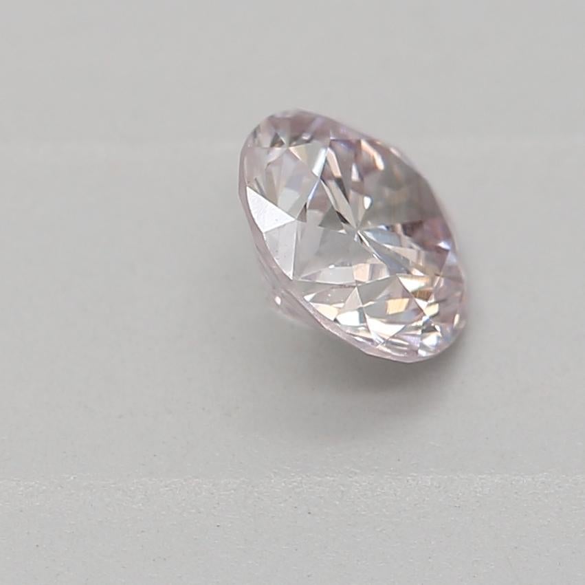 Women's or Men's 0.33 Carat Light Pink Round cut diamond I1 Clarity GIA Certified For Sale