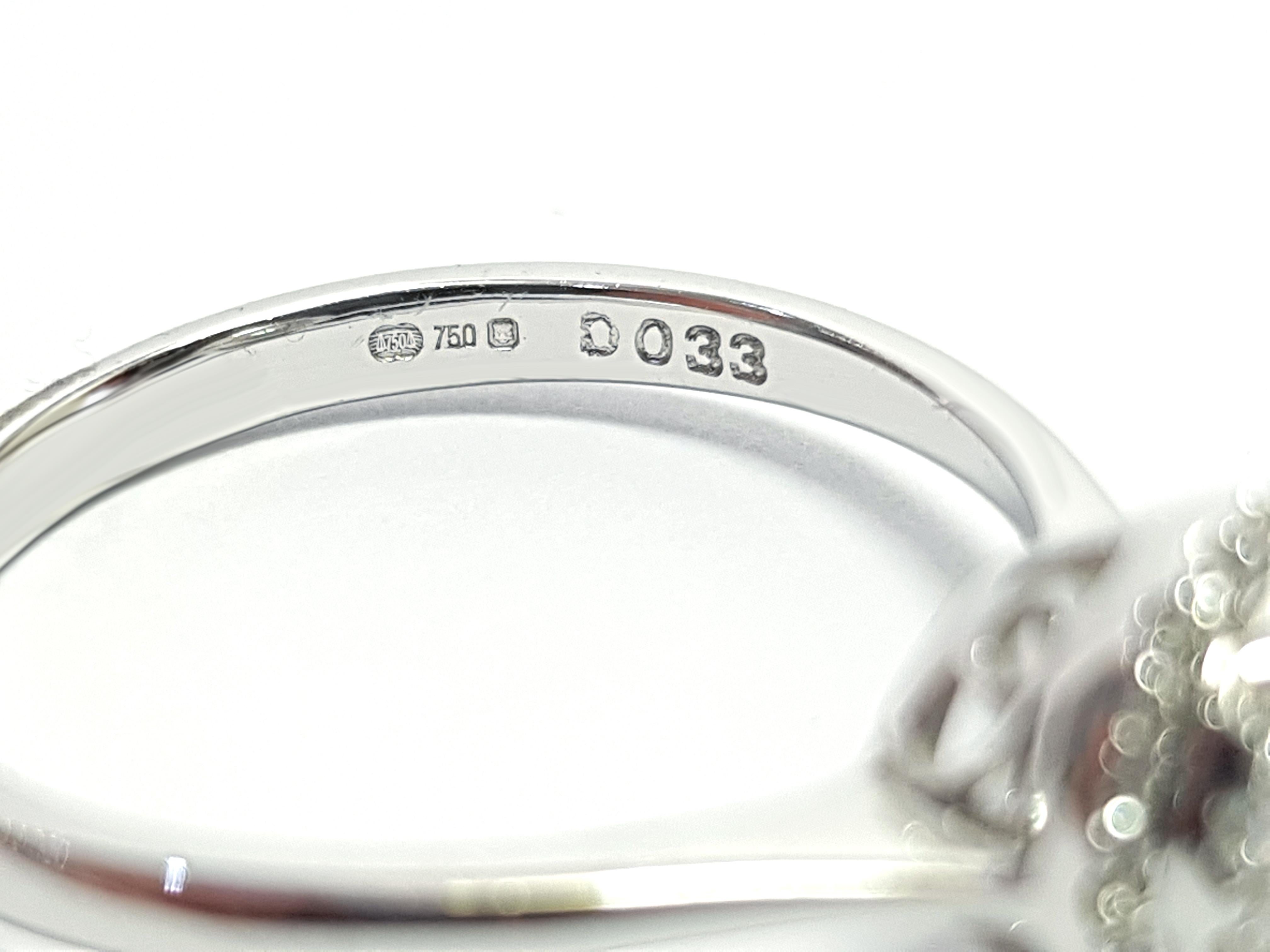 Modern 0.33 Carat Round Cut Cluster 18 Karat White Gold Halo Engagement Diamond Ring For Sale