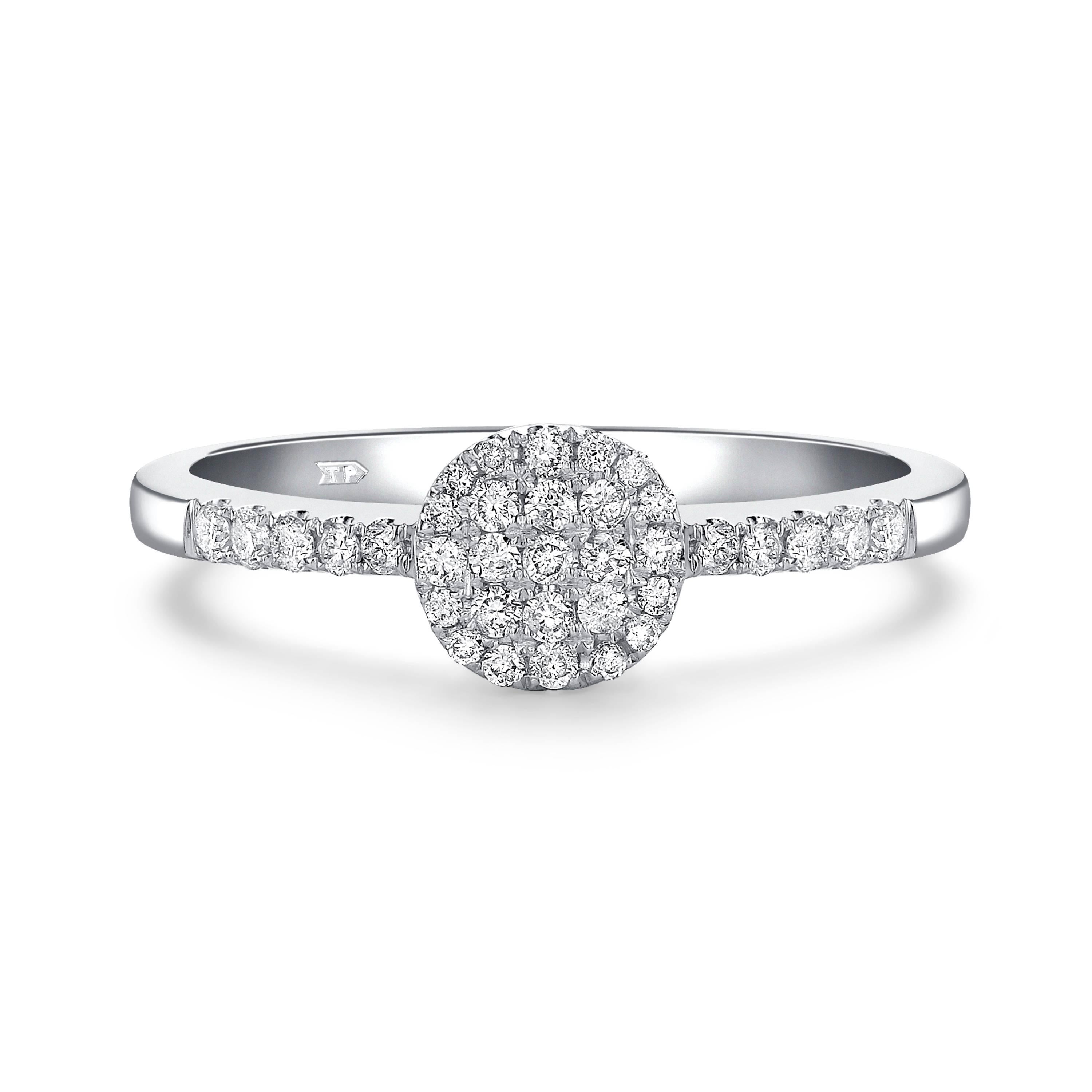 This delicate 0.33 Carat Round White Cut Diamond cluster engagement ring is set in 18 Karat White Gold, color H clarity SI1. Ring size UK - N, US - 7 1/2. Available in other carat sizes as well as ring sizes. British hallmarked by the London Assay