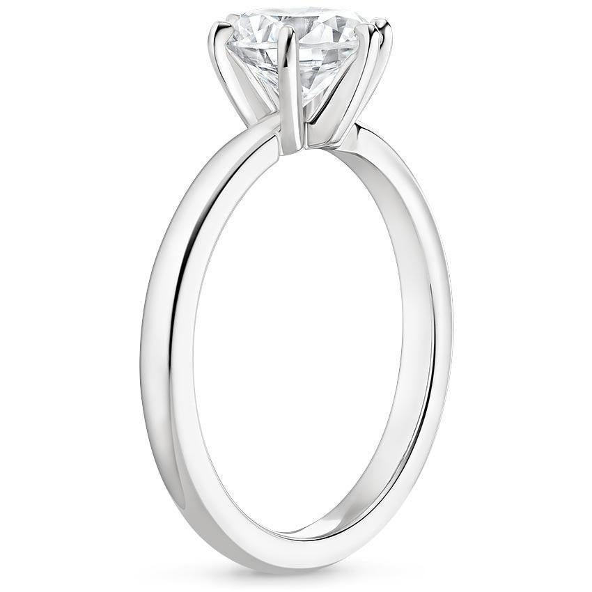 Featuring the classic solitaire engagement ring is a timelessly popular style. Without accents on the setting, a solitaire ring is the perfect choice to showcase a single center diamond. The color of the diamond is I-J and the clarity is SI.