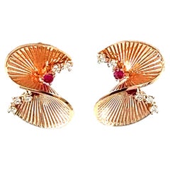 Boucles d'oreilles Art Déco en or rose avec diamant de 0,34 carat