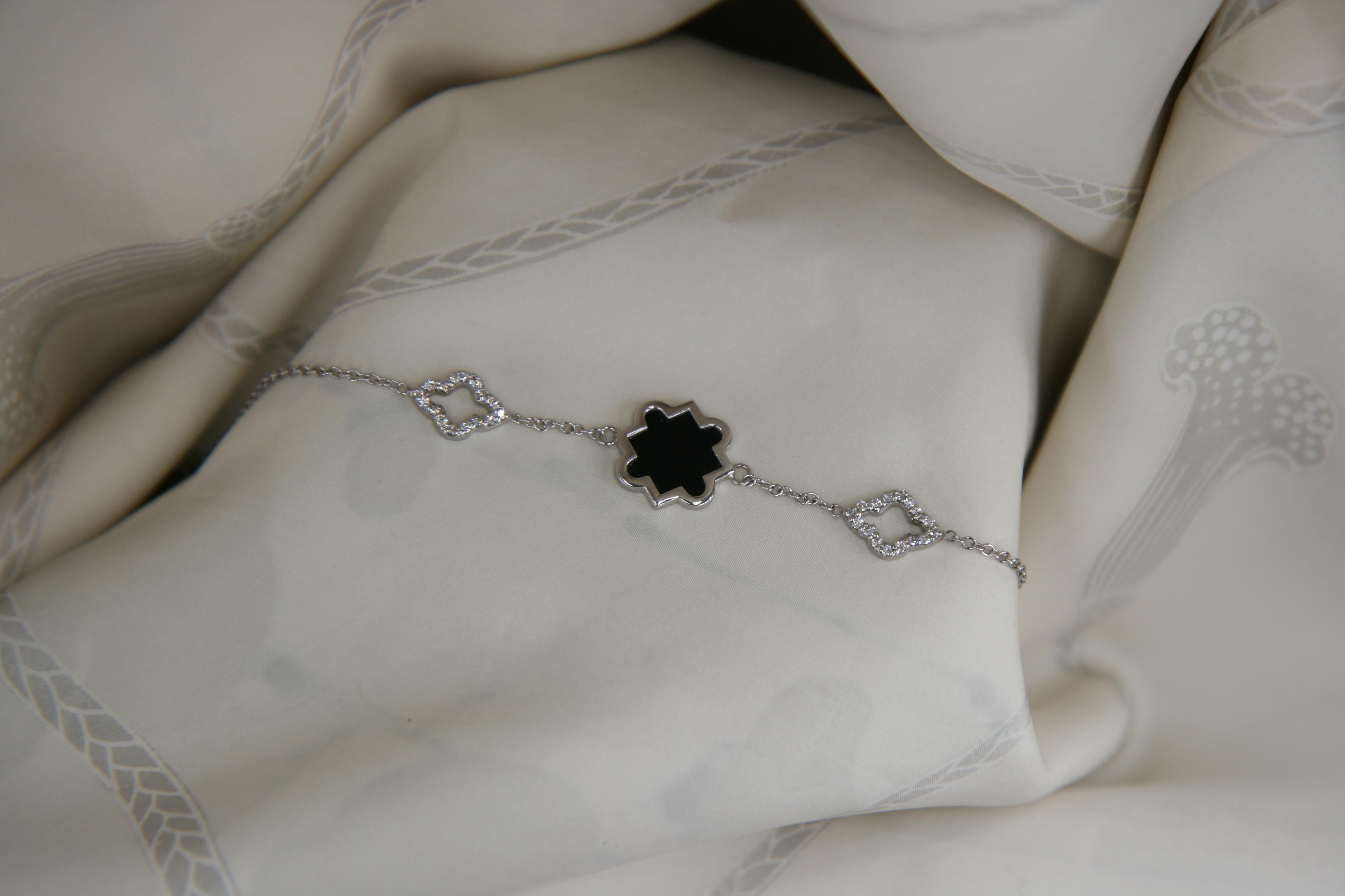 Magnificent and bright VS G color diamond Black  Onyx  Bracelet in 18 carat white gold Grams 3.43
Simplicity at it's best, one of our most sold item. the size of the bracelet starts to 17 cm and is adjustable up to 19 cm
any item of our jewelry
