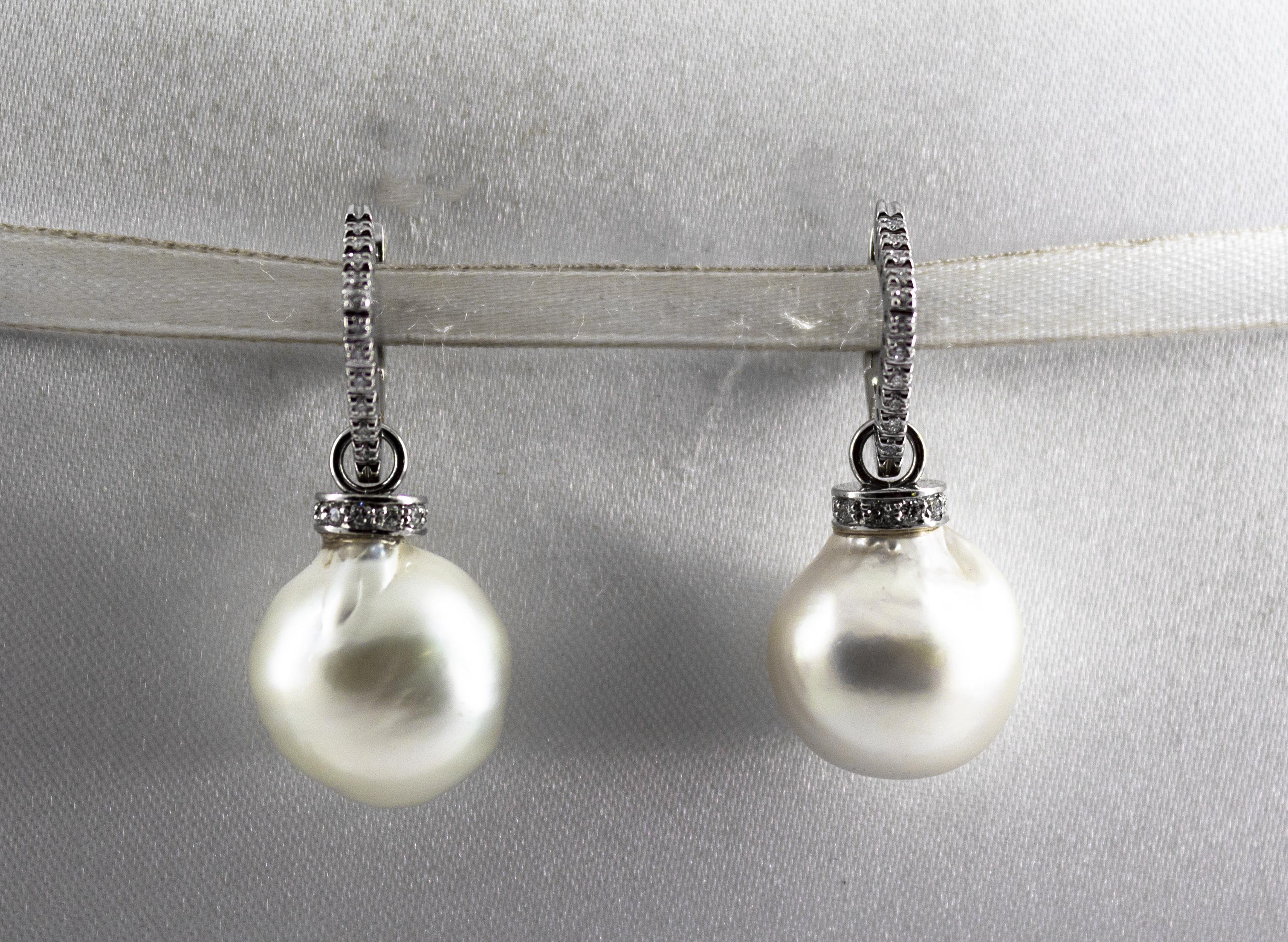 These Earrings are made of 18K White Gold.
These Earrings have 0.34 Carats of White Diamonds.
These Earrings have also Australian Pearls.
We're a workshop so every piece is handmade, customizable and resizable.