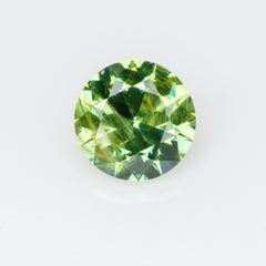 0,34 ct, Facettierter russischer Demantoid-Granat mit Bissolith-Einschlüssen