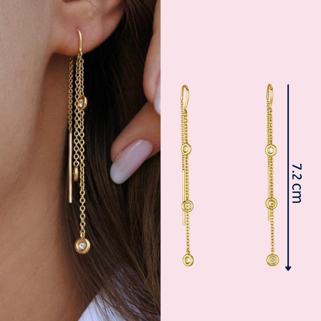 0.35 Carat Diamond Chain Threader Earrings in 14k Yellow Gold - Shlomit Rogel

Sleek, minimalist and oh so chic, these 14k yellow gold chain threader earrings are a fun way to add some elegant edge to your ear. Delicately embellished with 6 genuine