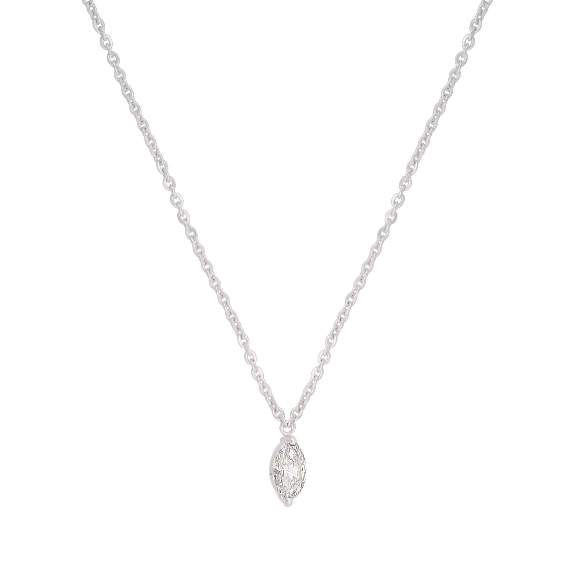 The centerpiece of this necklace is a stunning solitaire marquise-cut diamond, weighing 0.35 carats. The marquise cut, with its elongated shape and pointed ends, creates a sense of sophistication and uniqueness. The diamond's exceptional brilliance
