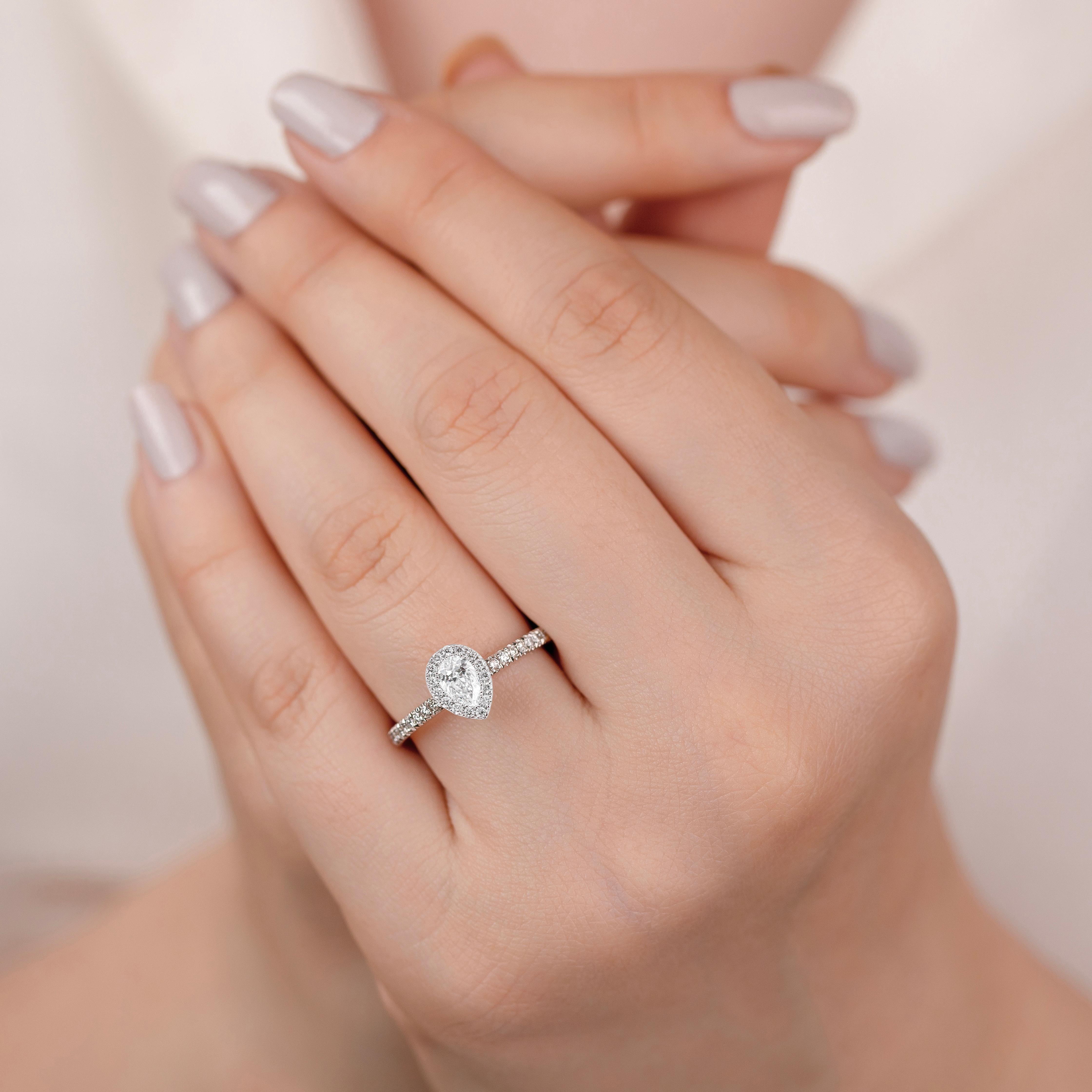For Sale:  0.35 ct Drop Cut Diamond Solitaire, Diamond Solitaire Ring with Edge Stone 9